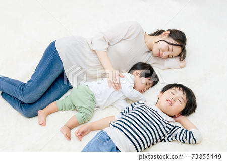 Mom sleeping with children Mom sleeping with children 73855449