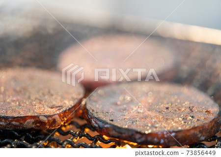 Arabiki sausage steak charcoal-grilled on a shichirin 73856449