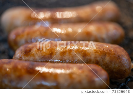 Frankfurt sausage charcoal grilled on a shichirin 73856648