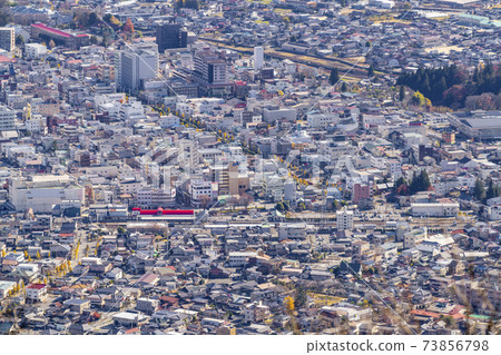 Scenery of Iida, Takamori, and Takagi seen from Kokuzoyama, Iida City, Nagano Prefecture 73856798