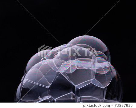 Soap bubbles isolated on black background. Macro Soap bubbles isolated on black background. Macro 73857933