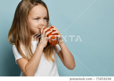 Happy smiling cute kid girl in white t-shirt Happy smiling cute kid girl in white t-shirt 73859298