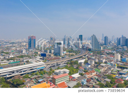 Aerial view of Bangkok Downtown Skyline with road street. Thailand. Financial district and business centers in smart urban city in Asia. Skyscraper and high-rise buildings. 73859634