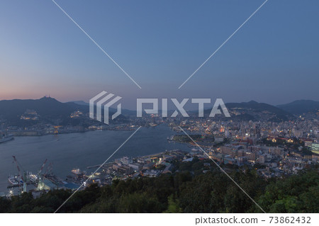 Evening view of Nagasaki city from Nabekanzan Park observatory Evening view of Nagasaki city from Nabekanzan Park observatory 73862432