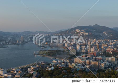 Evening view of Nagasaki city from Nabekanzan Park observatory Evening view of Nagasaki city from Nabekanzan Park observatory 73862445