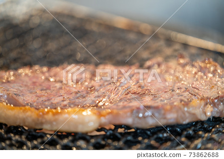 Domestic beef sirloin steak charcoal-grilled on a shichirin Domestic beef sirloin steak charcoal-grilled on a shichirin 73862688