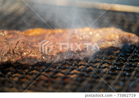 Domestic beef sirloin steak charcoal-grilled on a shichirin 73862719