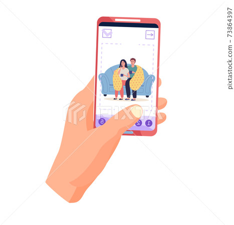 Guy holding phone with photo of couple on self-isolation. Man and woman in blanket drink tea Guy holding phone with photo of couple on self-isolation. Man and woman in blanket drink tea 73864397