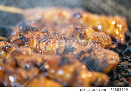 Yakitori peach charcoal grilled on a shichirin Yakitori peach charcoal grilled on a shichirin 73865509