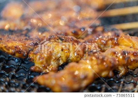 Yakitori peach charcoal grilled on a shichirin Yakitori peach charcoal grilled on a shichirin 73865511