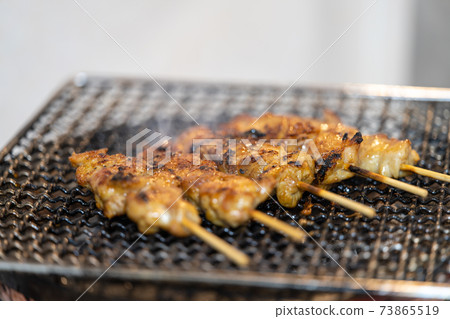Yakitori peach charcoal grilled on a shichirin Yakitori peach charcoal grilled on a shichirin 73865519