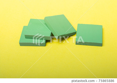 Colorful domino blocks on white background 73865886