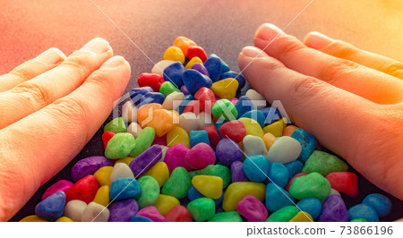 Pile of colorful pebbles as a stone background 73866196