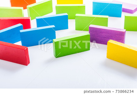 Colorful domino blocks on white background Colorful domino blocks on white background 73866234