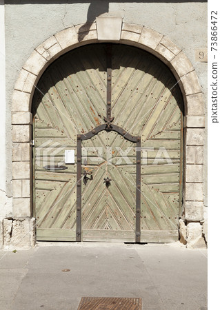 Typical decorated wooden door, Budapest. 73866472