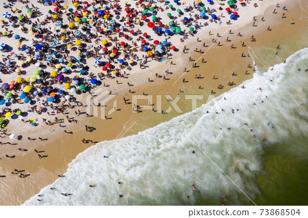 Aerial view of Copacabana beach with beach umbrellas and sun loungers . Rio de Janeiro, Brazil 73868504