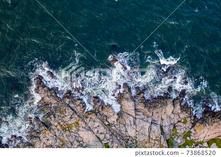 Drone View of rocky cliff coast on Bornholm, Denmark Drone View of rocky cliff coast on Bornholm, Denmark 73868520
