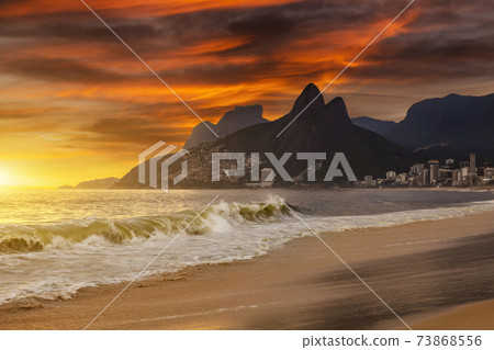 Sunset on the ocean at Rio de Janeiro, Ipanema beach. Brazil Sunset on the ocean at Rio de Janeiro, Ipanema beach. Brazil 73868556