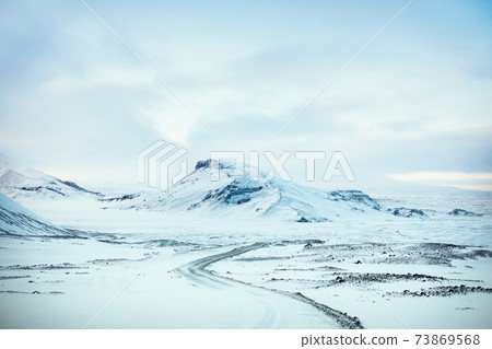 Snowy road to Langjokull glacier in Iceland during winter 73869568