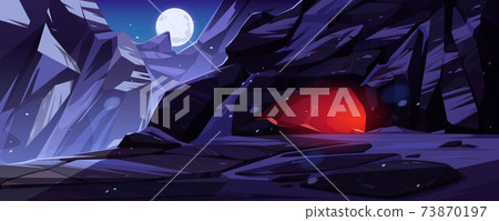 Entrance to cave in mountains at night Entrance to cave in mountains at night 73870197