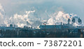 Smoke from the pipes of a metallurgical plant 73872201