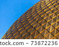 Gold plating on the dome against the sky 73872236