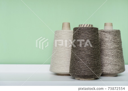 Set of colored yarn for knitting on cone 73872554