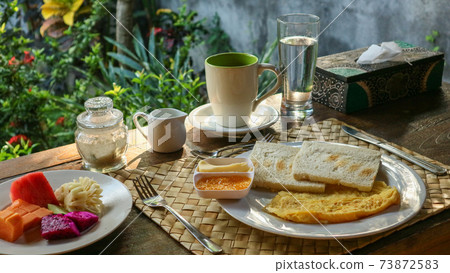 Traditional tourist breakfast in Bali Traditional tourist breakfast in Bali 73872583