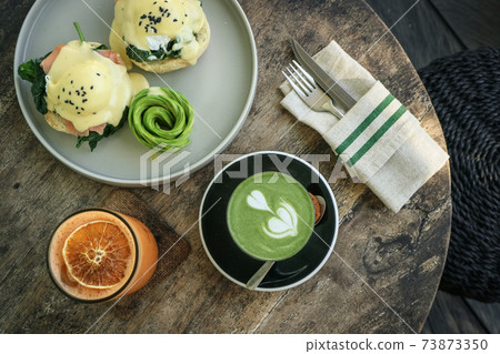 Avocado toast with poached egg 73873350