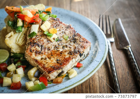 Grilled Tuna Steak served with mashed potato Grilled Tuna Steak served with mashed potato 73873797