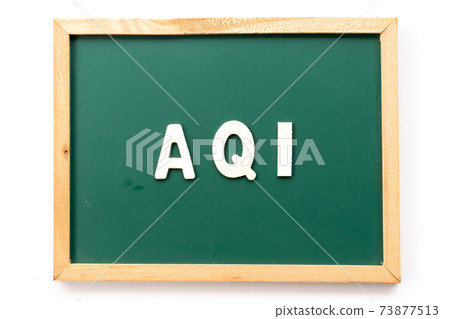 Alphabet letter in word AQI (Abbreviation of air quality index) in blackboard on white background Alphabet letter in word AQI (Abbreviation of air quality index) in blackboard on white background 73877513