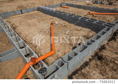 Foundations of the house, unfinished bungalow, rough construction Foundations of the house, unfinished bungalow, rough construction 73881011