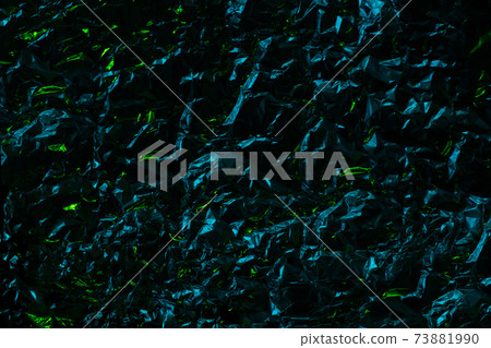 Black metal chrome texture with crumpled wrinkles and lime tints. Dark brutal background 73881990