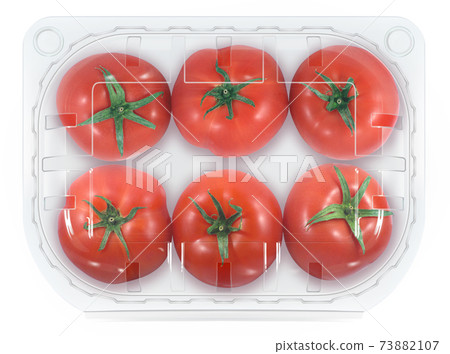 Transparent plastic container with fresh tomatoes isolated on a white background with a clipping 73882107