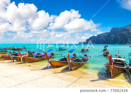 Traditional thai boat on Phi Phi Don Traditional thai boat on Phi Phi Don 73882426