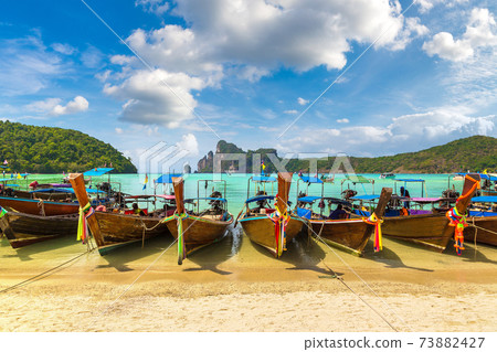 Traditional thai boat on Phi Phi Don Traditional thai boat on Phi Phi Don 73882427
