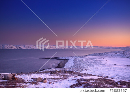 sunrise and sea bay in winter 73883567
