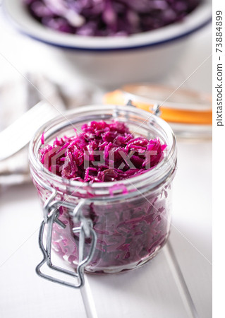 Red sauerkraut. Sour pickled cabbage 73884899