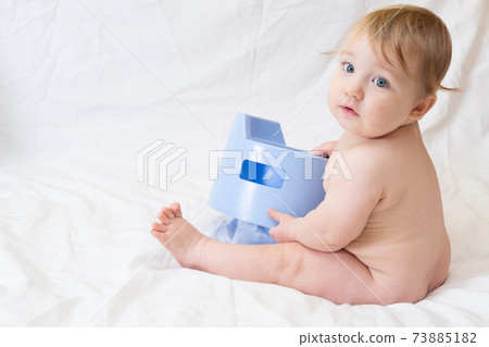 Cute blue-eyed Caucasian toddler sits near a... - Stock Photo [73885182 ...