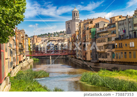 Colorful houses and Eiffel bridge in Girona Colorful houses and Eiffel bridge in Girona 73887353