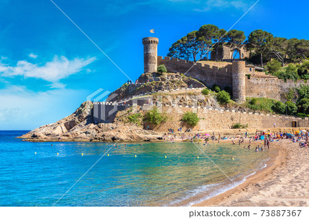 Beach at Tossa de Mar and fortress 73887367