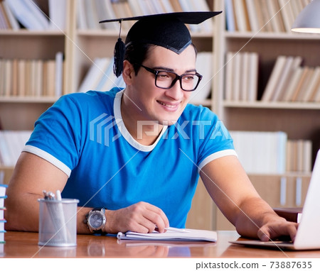 Young man graduating from university 73887635