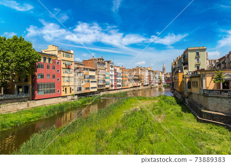 Colorful houses and Eiffel bridge in Girona Colorful houses and Eiffel bridge in Girona 73889383