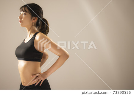 Female athlete sports 73890556