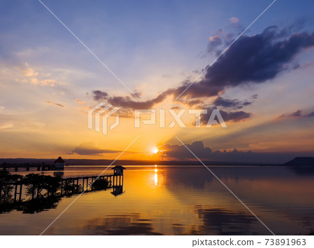 sunset in river at Lum Chae dam, Khonburi, Nakhon Ratchasima, Thailand 73891963