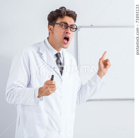 Funny doctor scientist making presentation in hospital 73893133