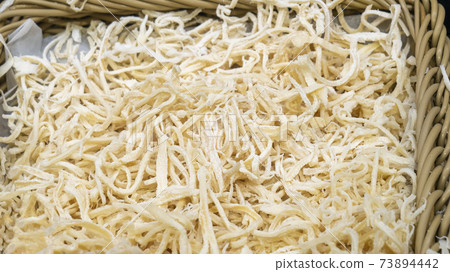 sliced dried squid close up sliced dried squid close up 73894442