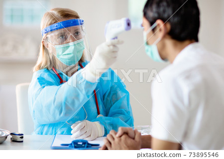 Coronavirus outbreak. Doctor and covid-19 patient. Coronavirus outbreak. Doctor and covid-19 patient. 73895546