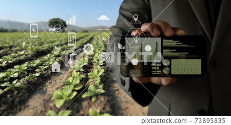 agriculture technology concept man Agronomist Using a Tablet Internet of things report. agriculture technology concept man Agronomist Using a Tablet Internet of things report. 73895835