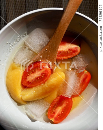 Candied yellow peaches, yellow peaches, cherry tomatoes, ice Candied yellow peaches, yellow peaches, cherry tomatoes, ice 73896195
